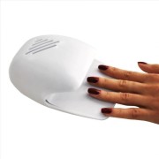 Mini secador de uñas UNIQ - Secador de uñas con aire (a pilas)